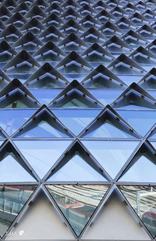 现代建筑几何玻璃幕墙设计美学 玻璃幕墙的视觉语言与创新趋势